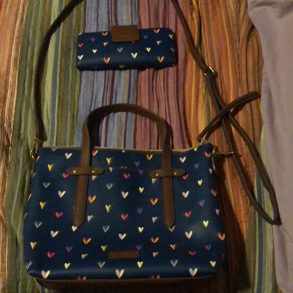 Fossil purse with matching wallet.. Never used